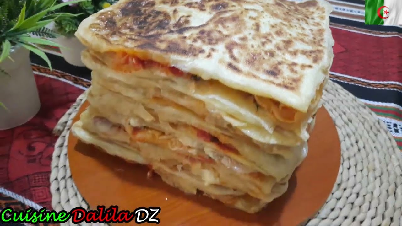محاجب جزائرية على زوج بالسلق و صلصة الجبن و لا اروع  Mhadjeb aux épinards et sauce fromagée