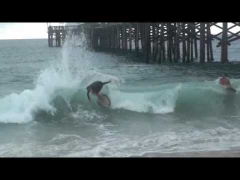 Lets Skimboard by the Pier.