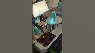 Fiber laser marking machine with rotating platform used in thermos cup curved surface marking