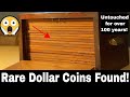 Rare silver dollar coins found in a wooden cabinet