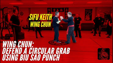 Defend A Circular Grab Using Biu Sao Punch - Wing Chun