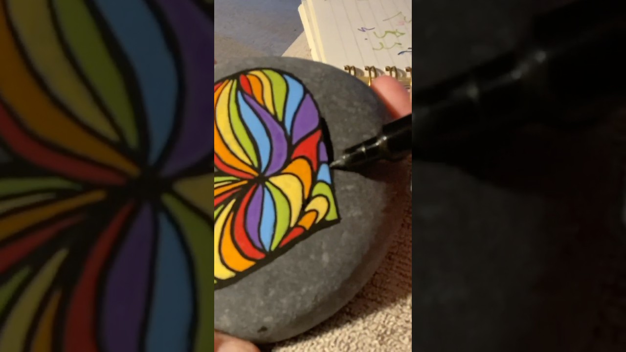 Rainbow heart design with paint pens. 