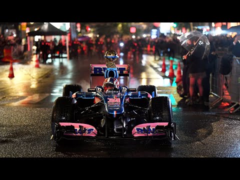 Esteban Ocon delivering the Ballon D’OR in Alpine Formula 1 car