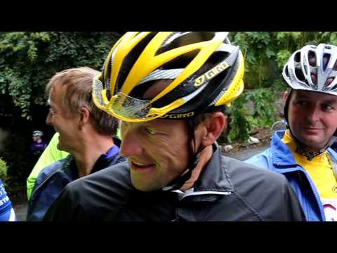 Lance Armstrong rides in Paisley Glasgow Scotland UK