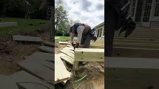 He’s like a dang sculpture artist! 🎨🖌️#build #carpentry #carpenter #deck #deckdesign