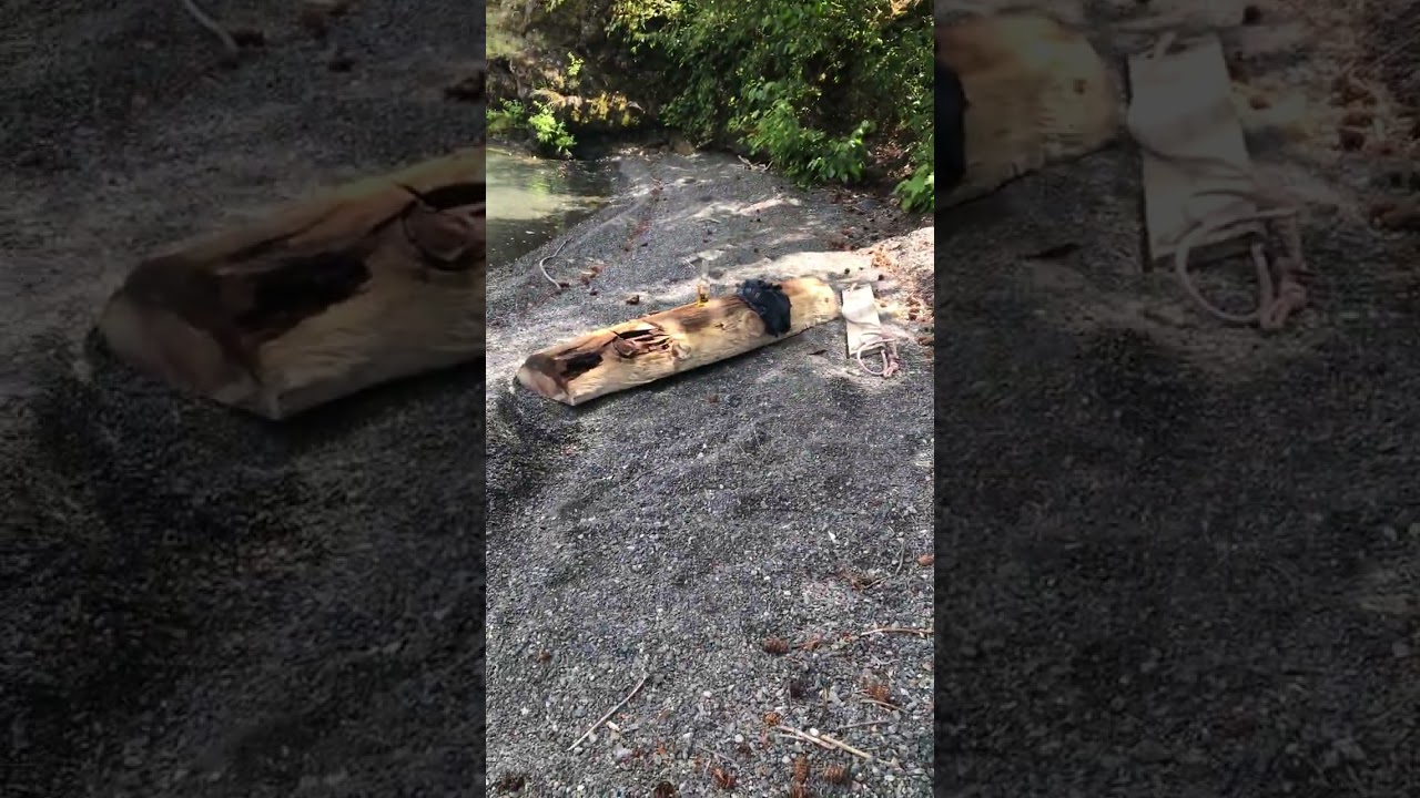 Girl goes on rope swing but let's go early and lands on rocks before water