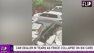 CAR DEALER IN TEARS AS FENCE COLLAPSE ON SIX CARS
