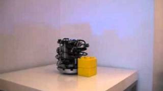 Pushing block simulation with a Khepera III