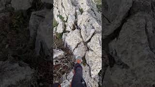 Balancing On A Mountain Peak In Spain.