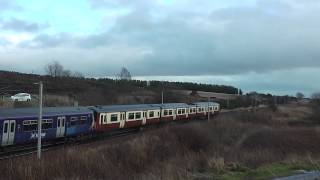 ScotRail Class 320 and SPT Class 318 pass Cartland 2/1/14