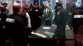 Heckler ejected from London Cosby show.
