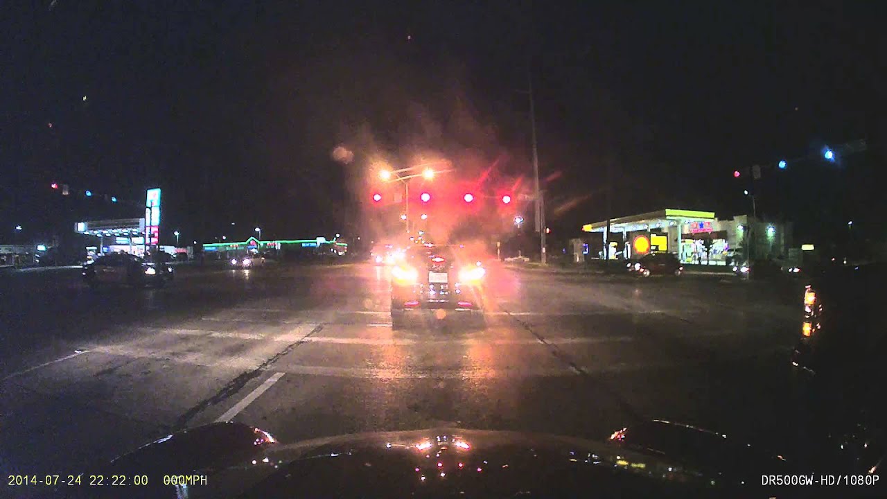 Police car catches red light runner - YouTube