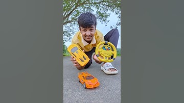 two yellow and red RC car unboxing
