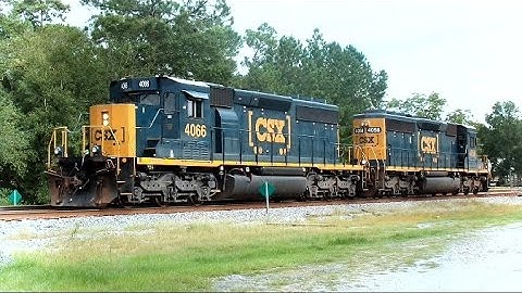 CSX Train Passes CSX Work Train Switching On Siding