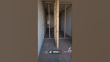 Interior wall framing in shipping container home.