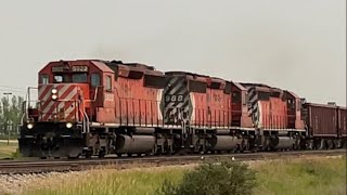 Chasing old Cp SD40-2 triple header carrying Herzog Ballast cars entering Red Deer AB (1/2) part 1.