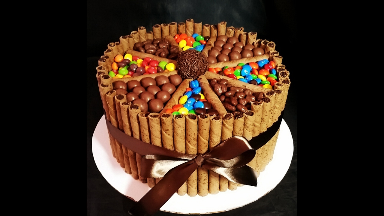 Arriba 54+ imagen pastel de chocolates y dulces