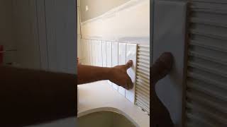 Laying vertical subway tiles construction tiling