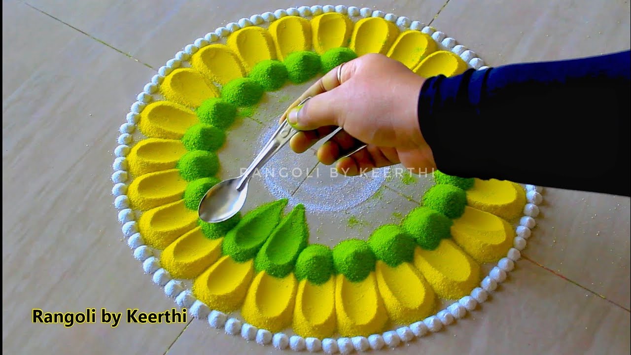 Simple rangoli for diwali using spoon l महालक्ष्मी रांगोळी l easy ...
