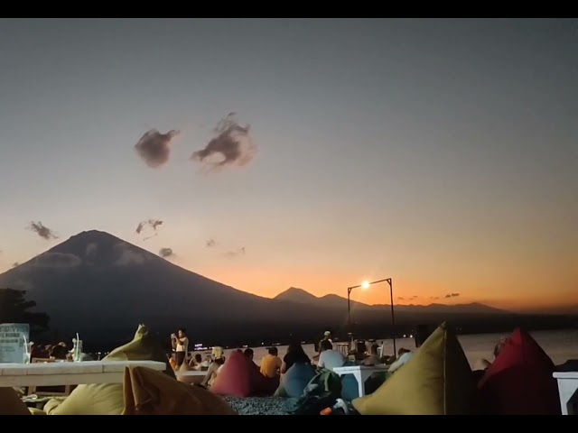 Amed beach sunset with Agung volcano time lapse #indonesia #bali #traveltheworld  #sunset class=