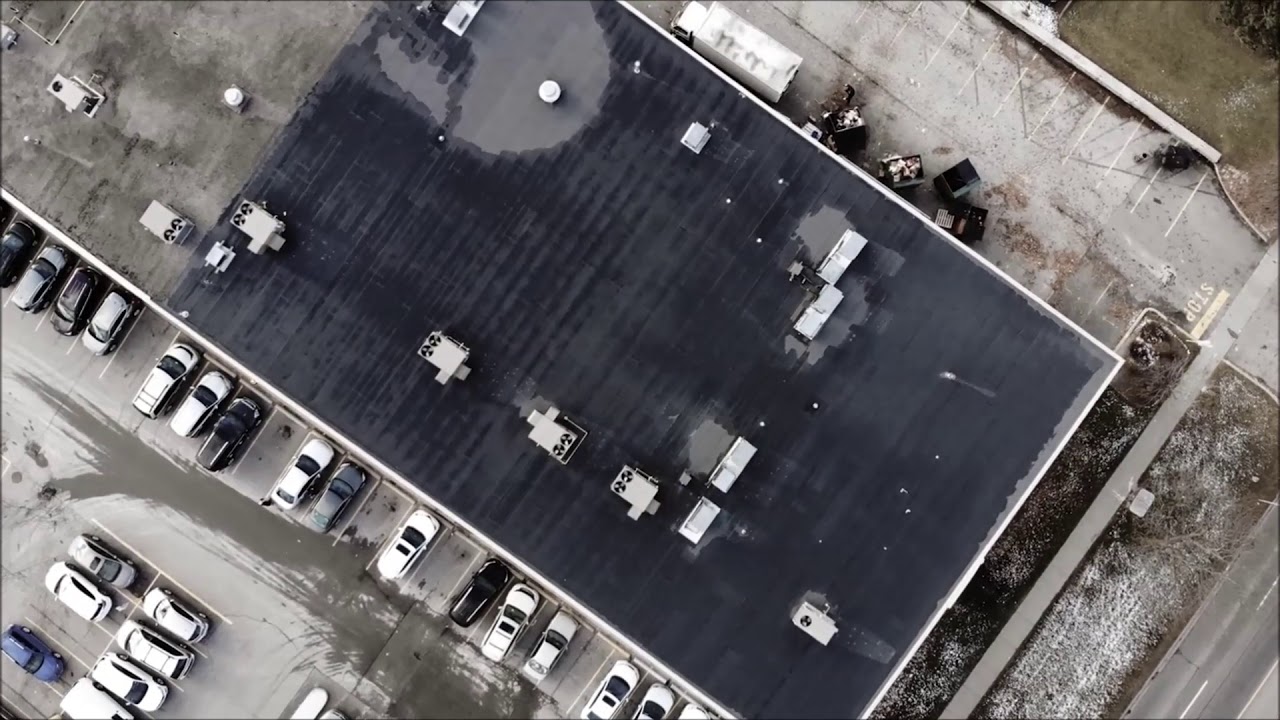 Still from NorthCan Roofing's own film: Commercial Flat Roof Repair at 5637 Finch Avenue East, Scarborough