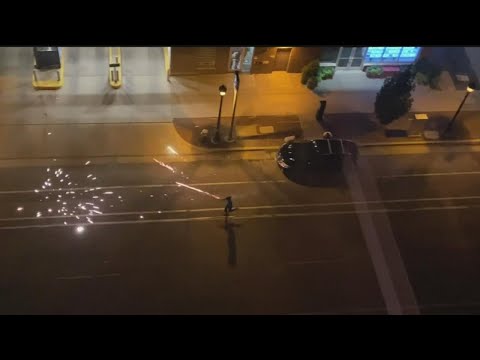 Fireworks fired from cars, toward buildings in downtown Minneapolis