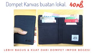 Dompet buatan lokal ini lebih bagus daripada Dompet impor.