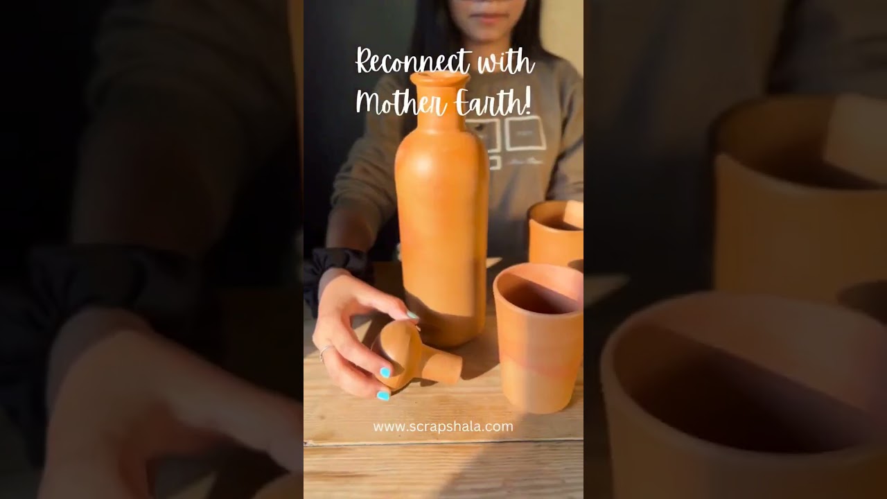 Terracotta bottle and glass set by 