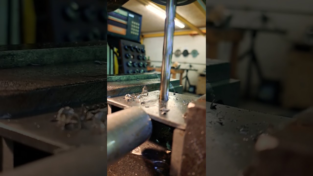 Drilling some pilot holes for a 1" hole.