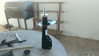New shock absorber not returning?