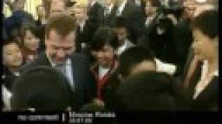 Russian President Dmitry Medvedev meets children from China