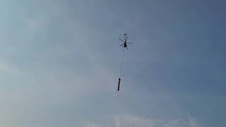 Helicopter Cutting Power Line Trees