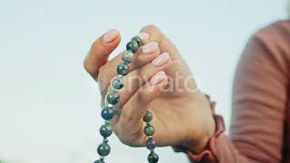 Woman Lit Hand Close Up Counts Rosary - Malas Strands of Gemstones Beads Used for Keeping Count ... screenshot 5