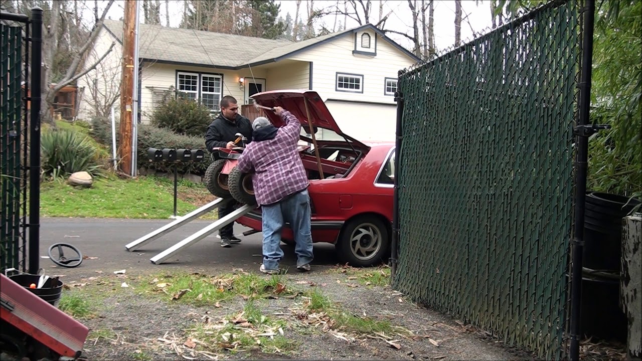 HOW TO Load a RIDING LAWNMOWER into the TRUNK of your CAR. A PLYMOUTH