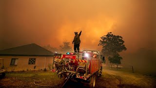 Four firefighters are injured after fire break containment lines in NSW