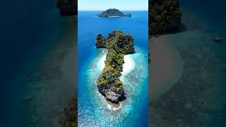 This island doesn't look real... 🌊 #island #nature #travel #droneview #ocean #explore #naturelovers