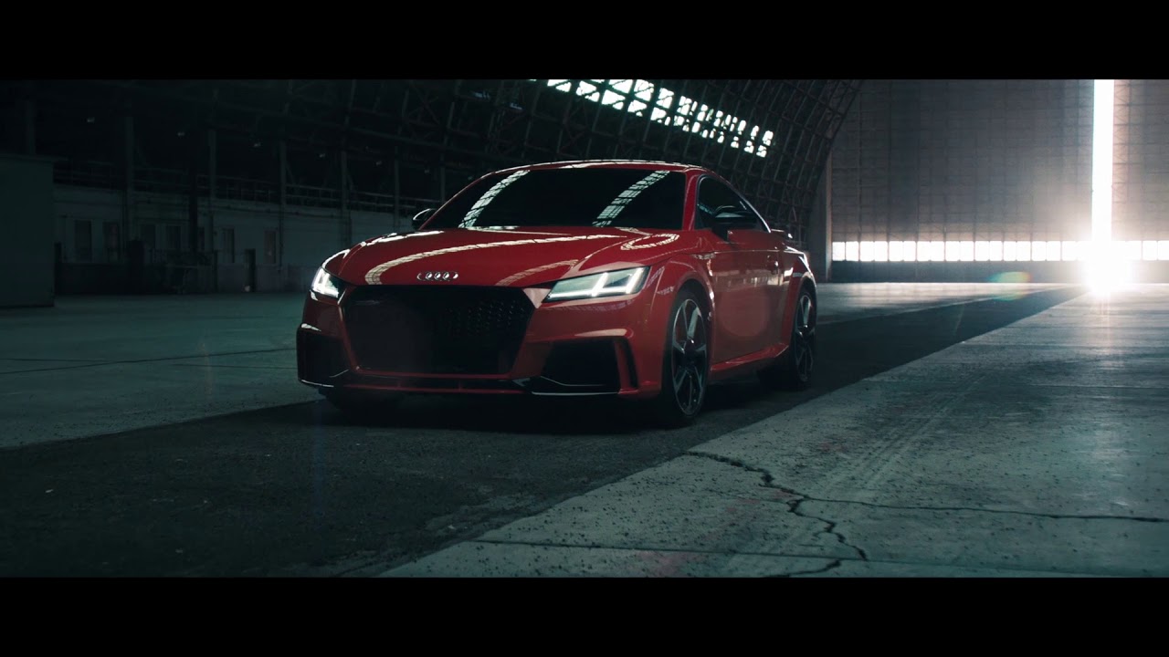 The Audi TT RS Coupé in Catalunya red. You're welcome