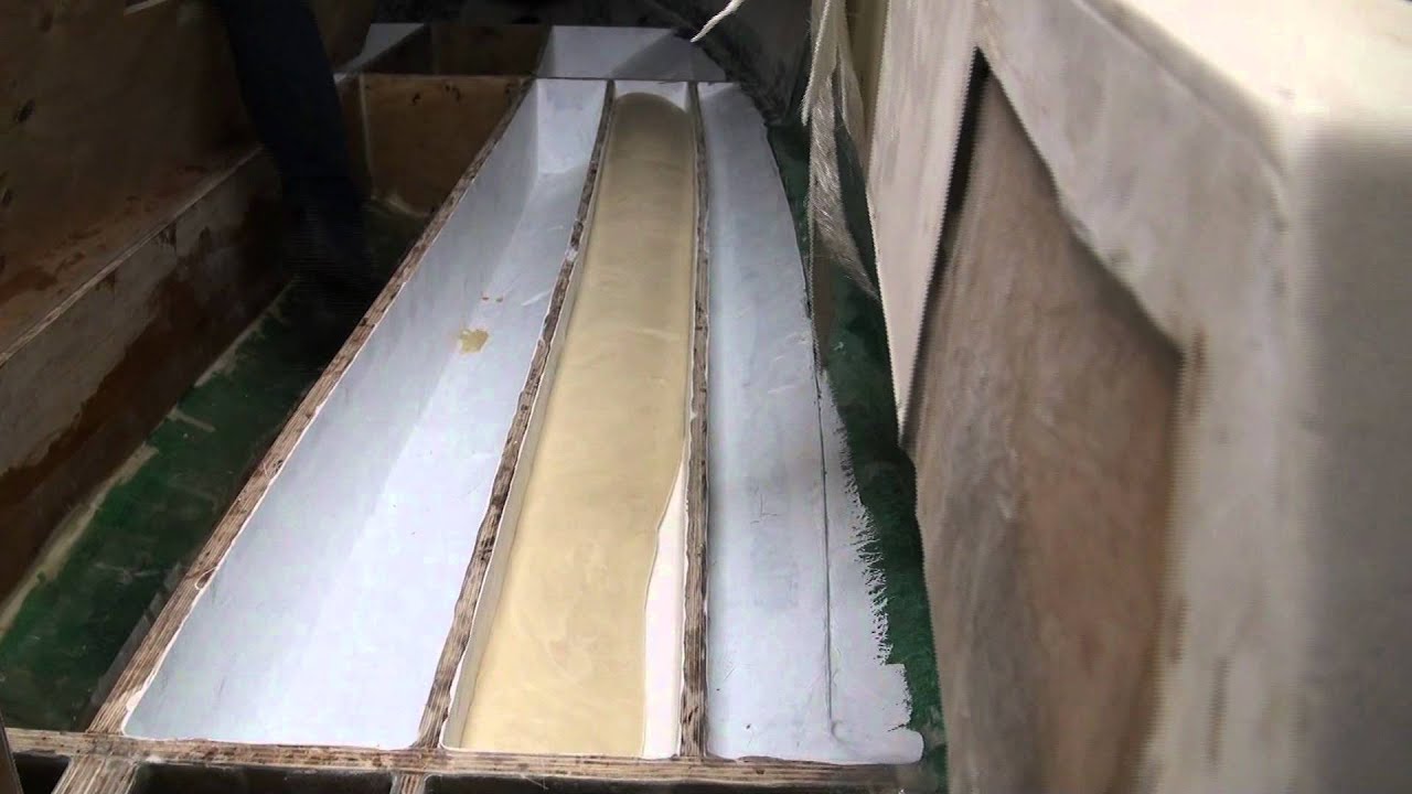 Spearo Australia foam filling a stringer in a v17r - YouTube