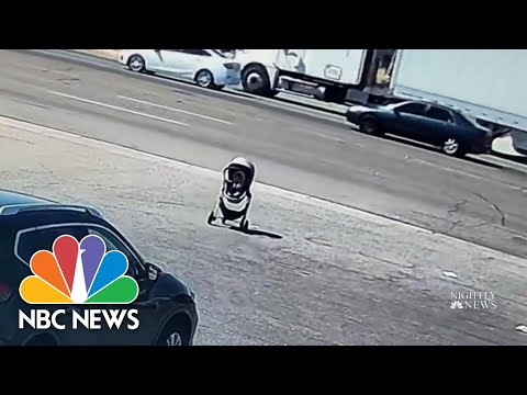 WATCH-Man-races-to-save-baby-stroller-rolling-towards-traffic