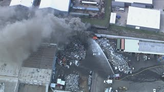 North Texas first responders battle fire at Garland scrap yard; Traffic stalled in Grand Prairie