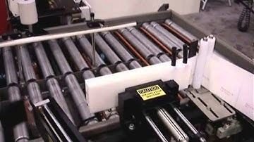 Trailing Edge Print Apply Labeling System on Boxes on Conveyor