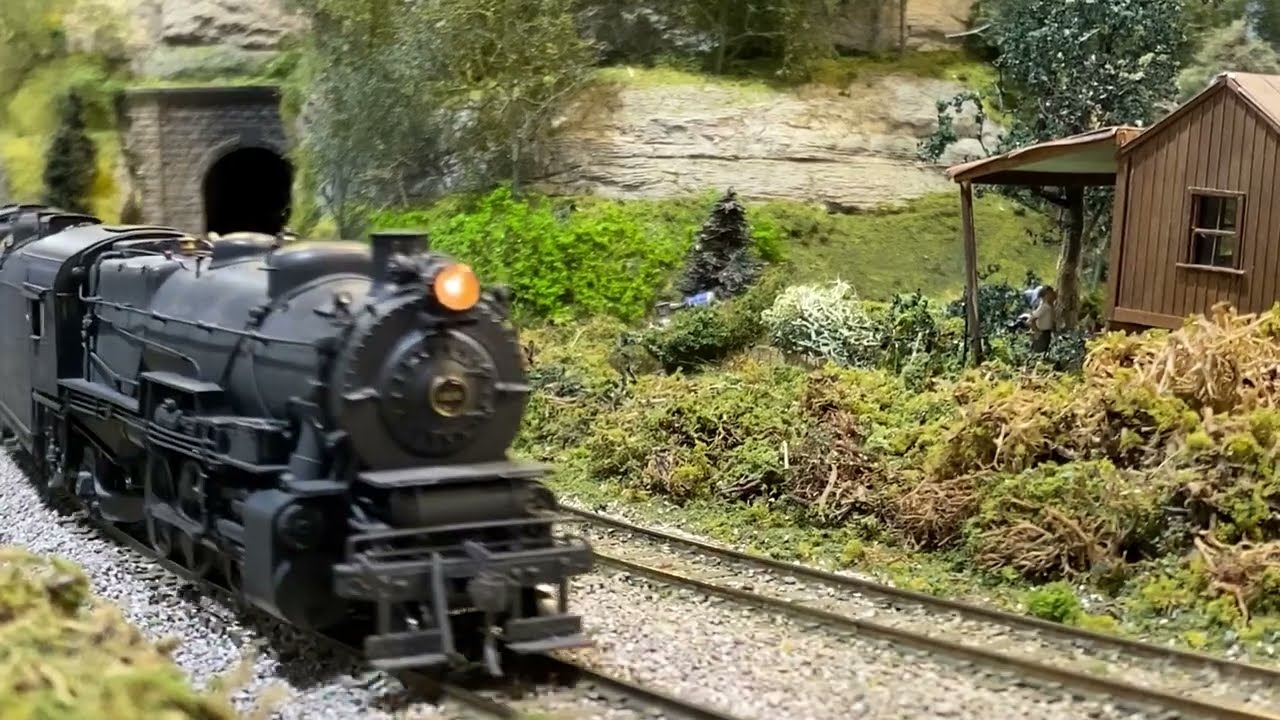 Doubleheaded PRR L1s’s with the local freight ramble past a cabin