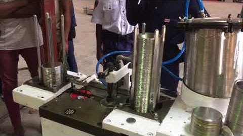 Round tin can lid lining machine