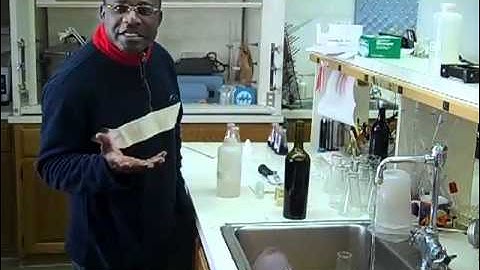 Checking Brix in the lab at Langtry Estate & Vineyards