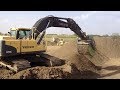 Flipscreen excavator screening bucket  dirt in scrap yard