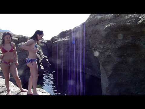 Caoimhe jumping into Hatta Pools in Oman, Arabia