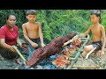 Survival in the rainforestfound crocodile for cook with mushroom near river  eat with twos boy