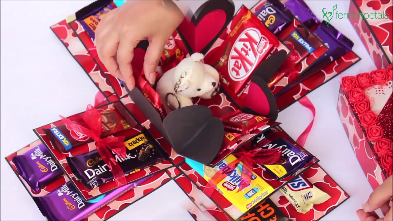 An explosion box as a present with money and chocolate