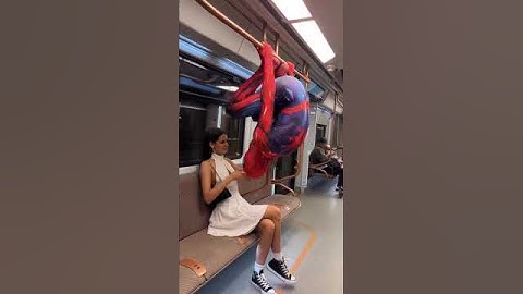 Spider-Man kiss random girl on subway 👀 #shorts #spiderman #kiss