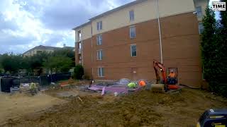 Backfill and grading time lapse of an elevator build